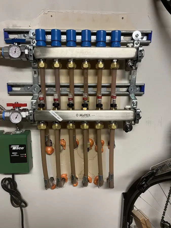 Plumber performing Gas Line Installation at a residential property in Southfield